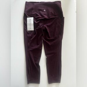 NWT Athleta SALUTATION STASH HIGH RISE 7/8 LEGGING in Spiced Cabernet—Small
